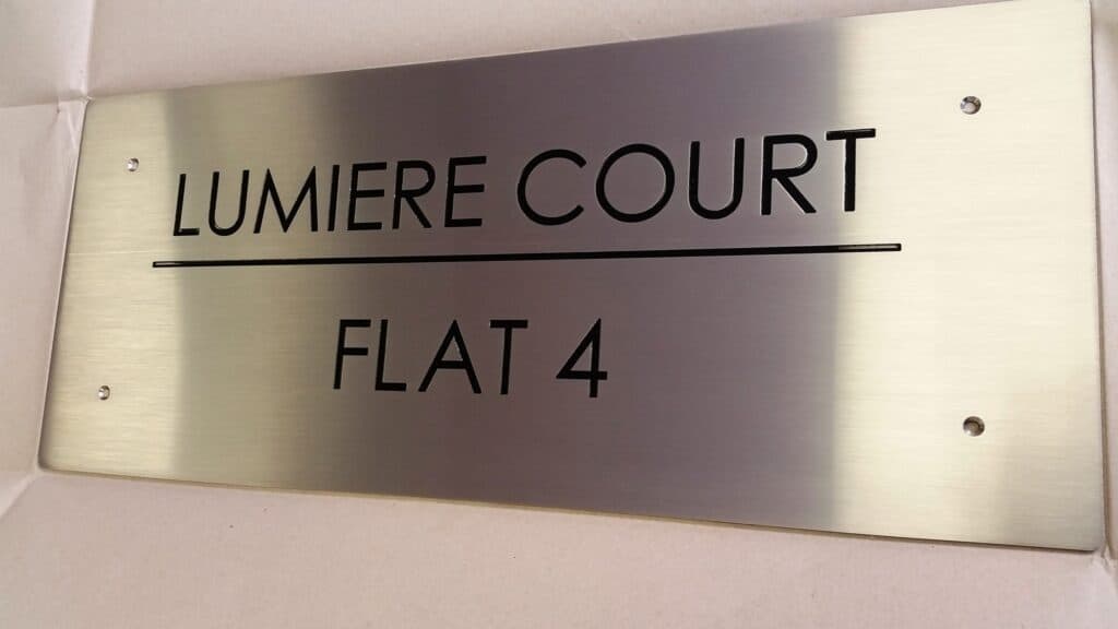 Stainless Steel Business Sign